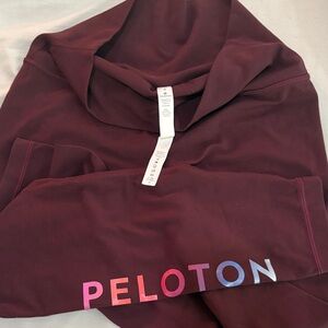 Peloton Maroon Lululemon leggings with Multicolor Logo